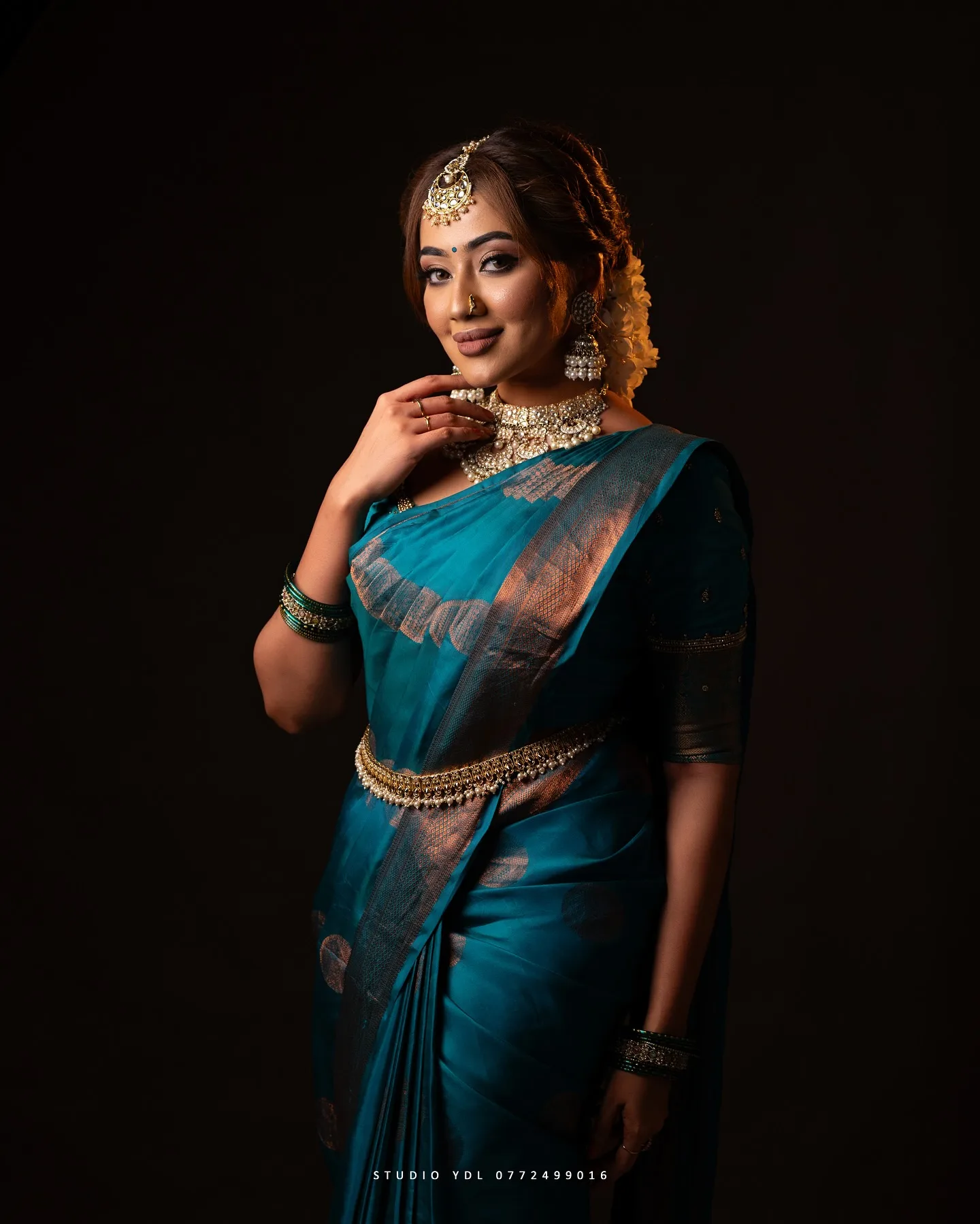 Teal saree close-up